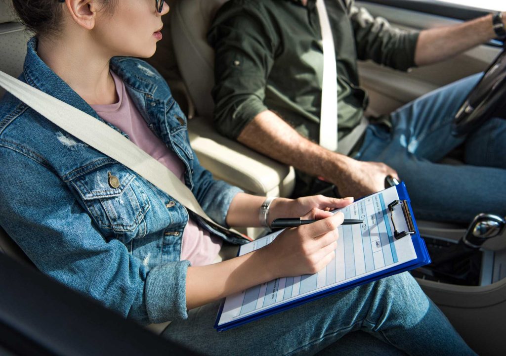 student-and-teacher-in-car-at-dri-FUHBPMU.jpg